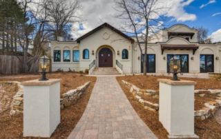 beautiful spanish style home with large front door entry way